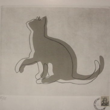 “cat with high paw”